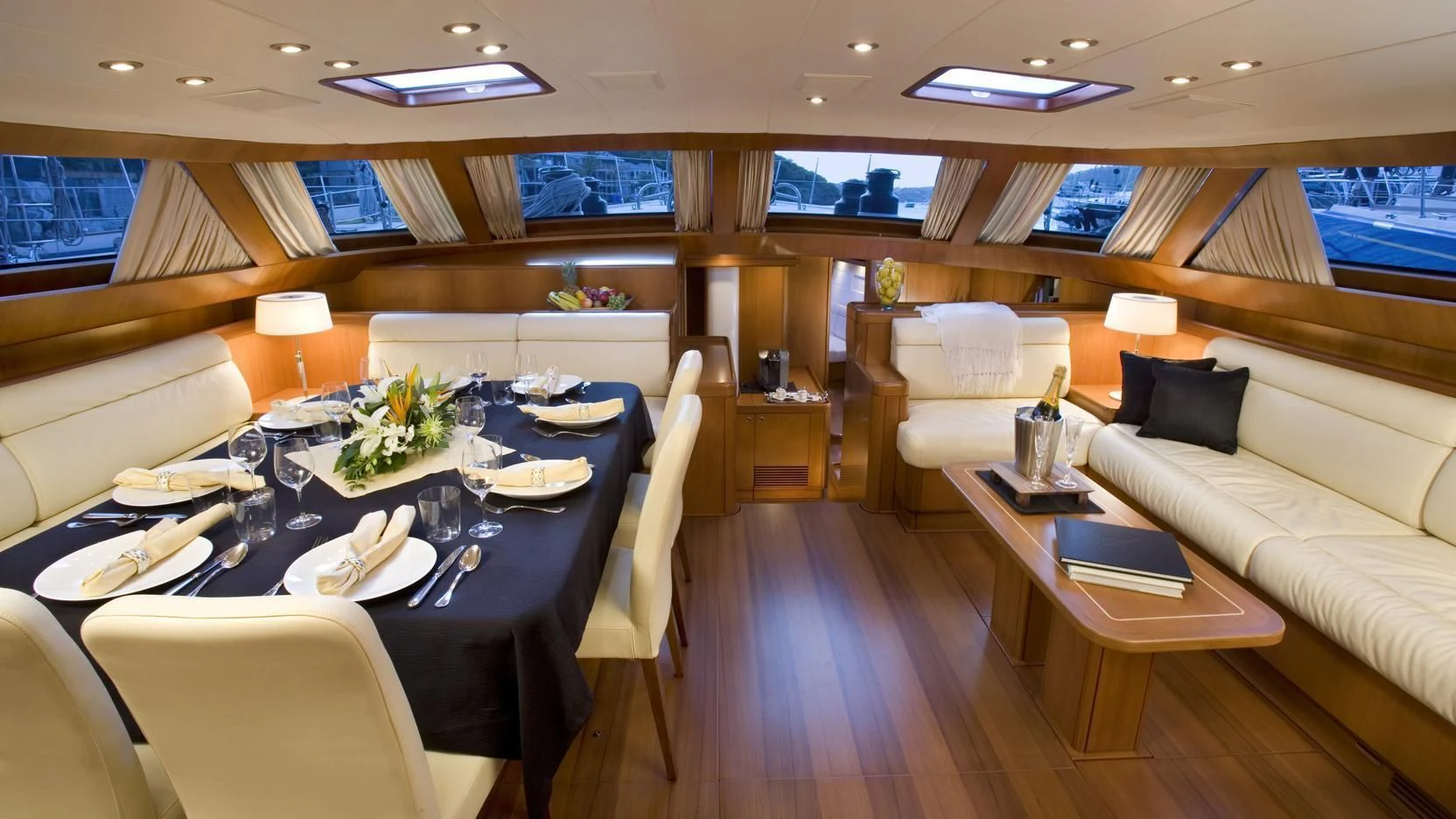 a room with a table and chairs aboard THIRTY NINE Yacht for Sale
