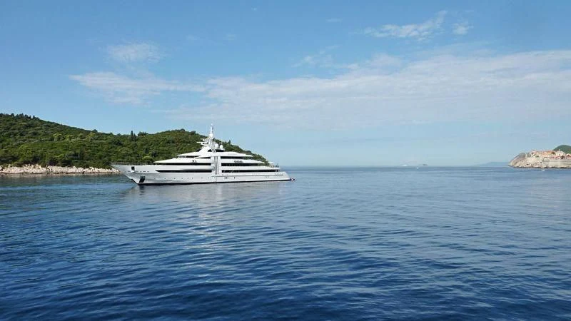 a boat on the water aboard VIBRANT CURIOSITY Yacht for Sale