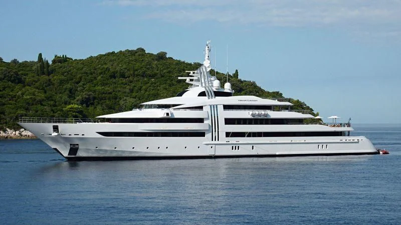 a white yacht on the water aboard VIBRANT CURIOSITY Yacht for Sale