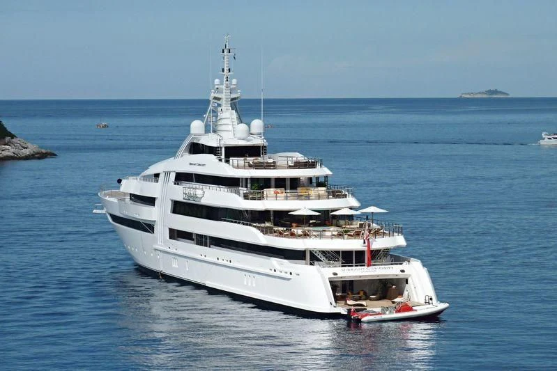 a large white boat in the water aboard VIBRANT CURIOSITY Yacht for Sale