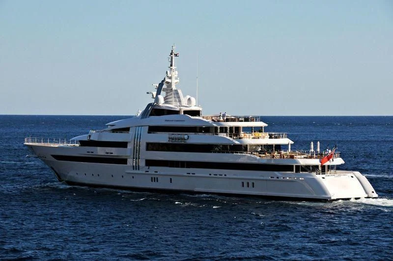 a large white ship in the water aboard VIBRANT CURIOSITY Yacht for Sale