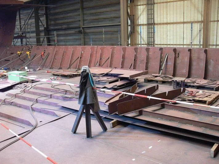 a black umbrella on a colorful floor aboard VIBRANT CURIOSITY Yacht for Sale