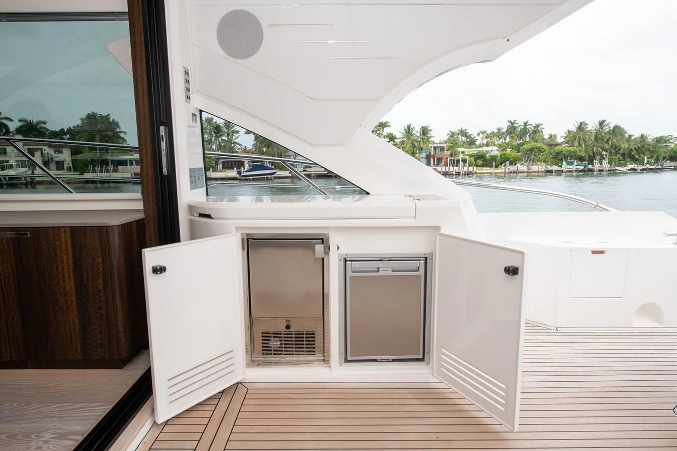 a room with a large window and a view of the water aboard INCENTIVIZED Yacht for Sale