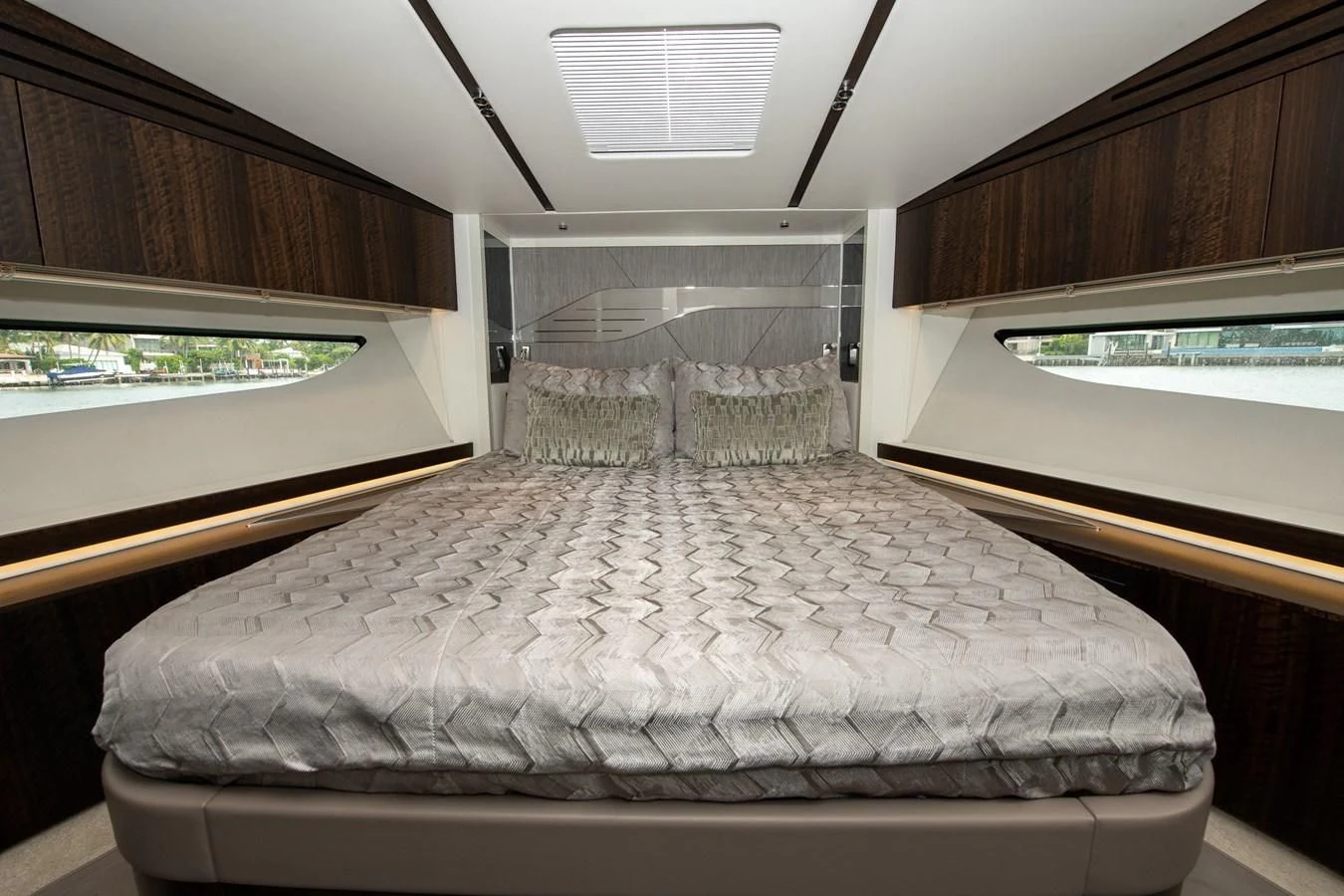 a large bed in a room aboard INCENTIVIZED Yacht for Sale