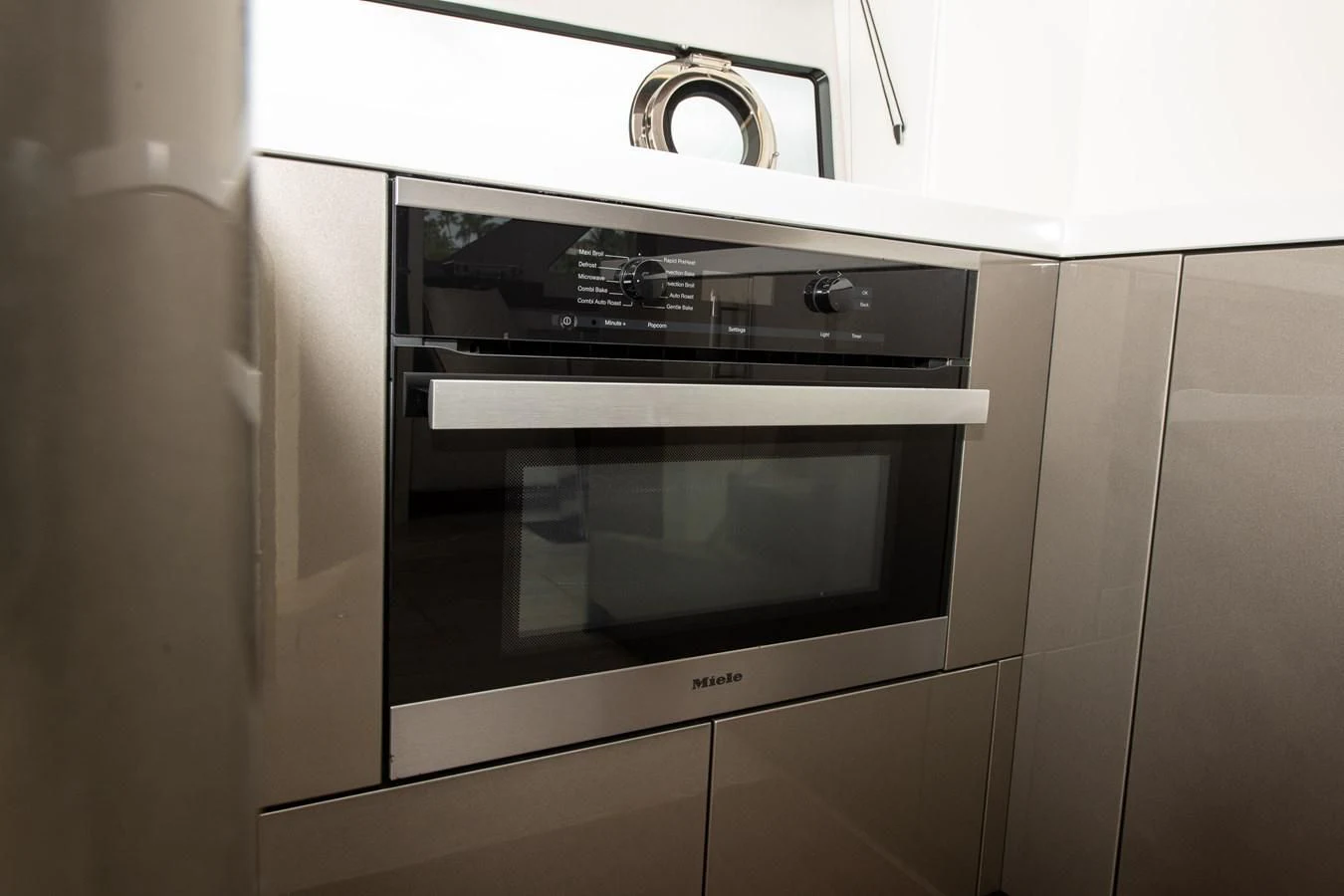 a silver oven in a kitchen aboard INCENTIVIZED Yacht for Sale