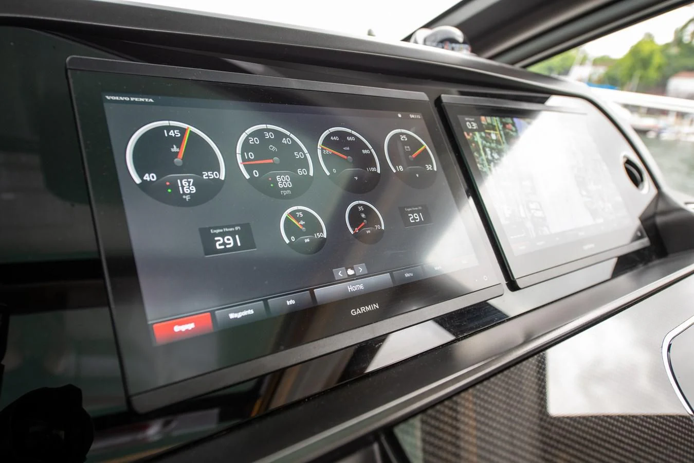 a car dashboard with a digital display aboard INCENTIVIZED Yacht for Sale