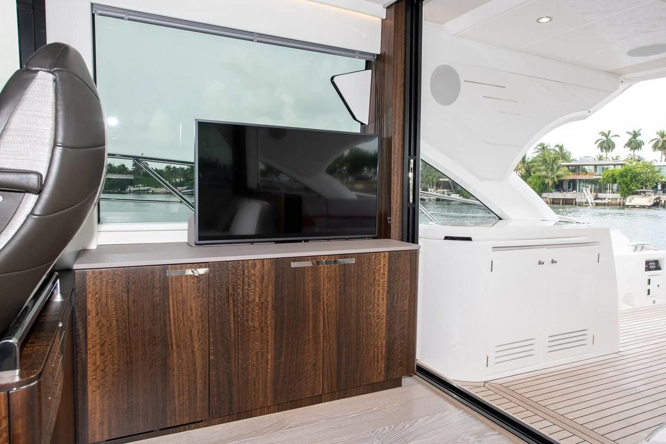 a room with a large window and a microwave aboard INCENTIVIZED Yacht for Sale