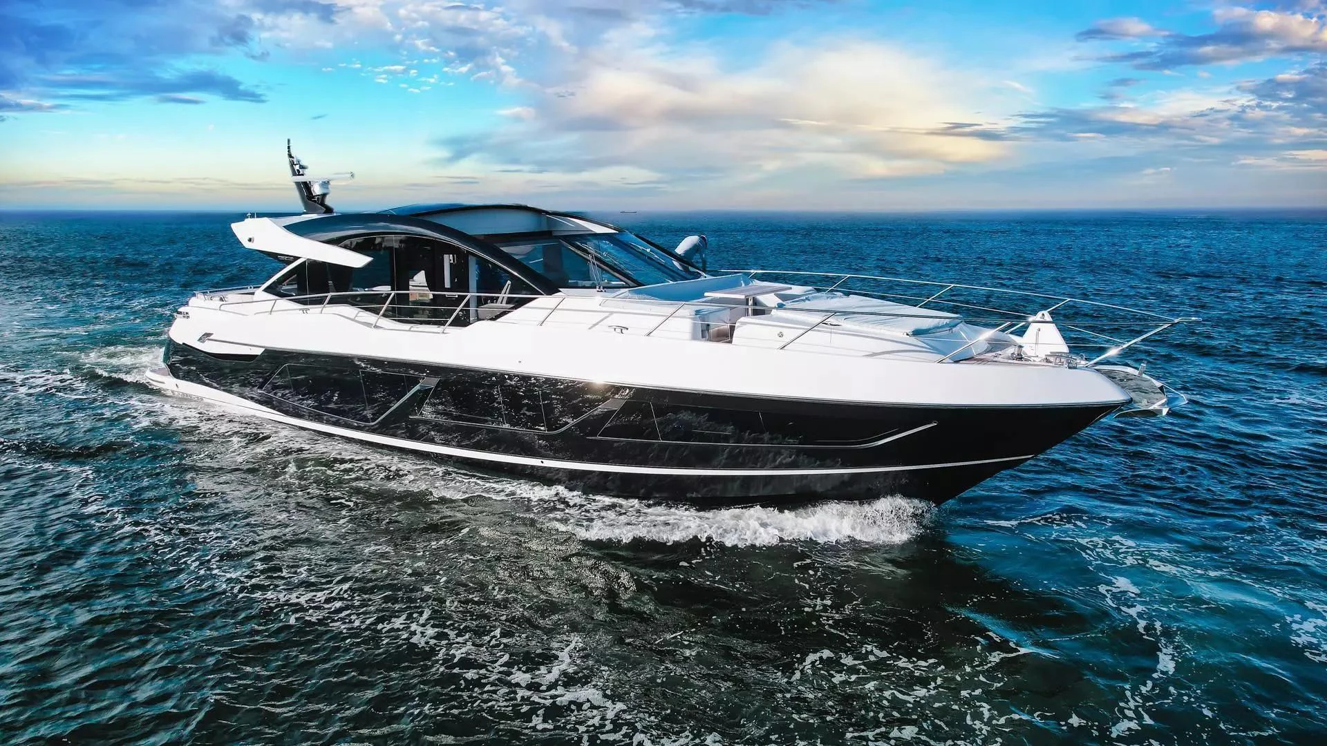 a white yacht in the water aboard INCENTIVIZED Yacht for Sale