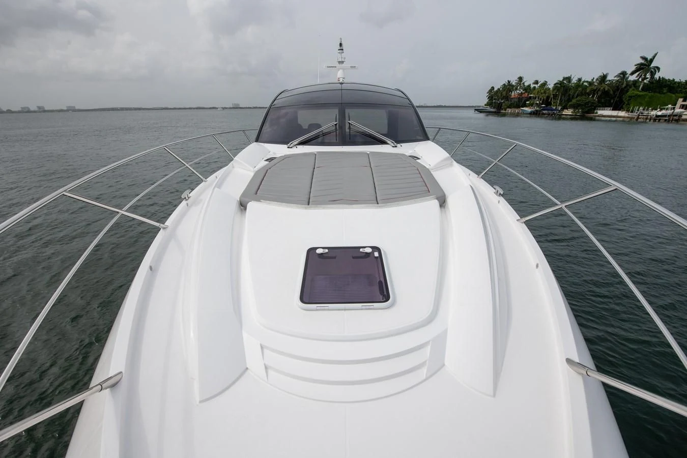 a white car on a road aboard INCENTIVIZED Yacht for Sale