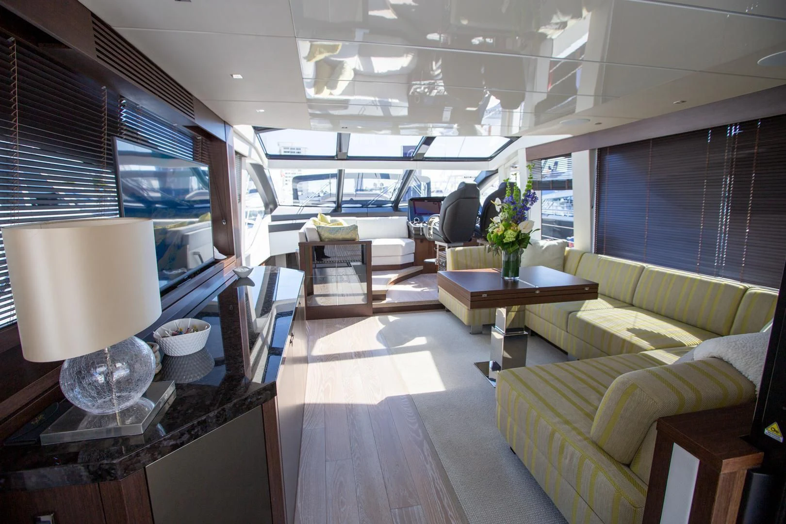 a room with a table and chairs aboard INCENTIVIZED Yacht for Sale