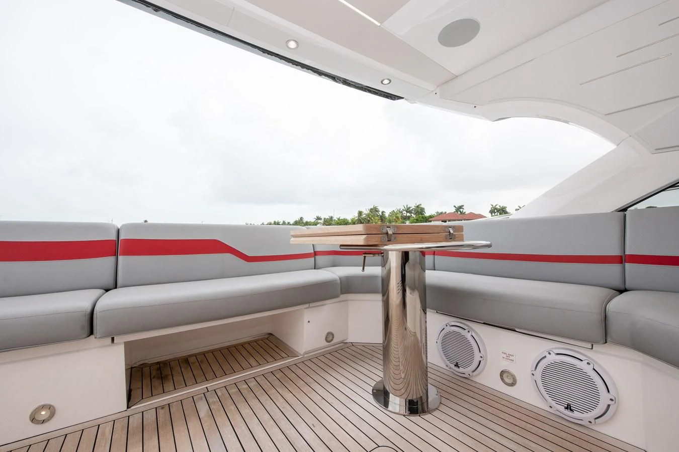 a white and red striped boat aboard INCENTIVIZED Yacht for Sale