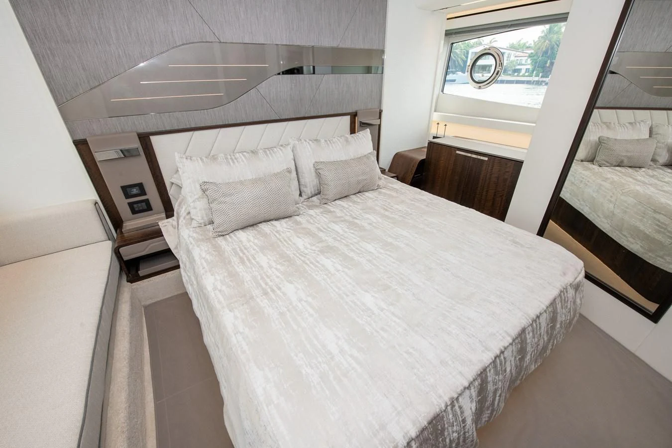 a room with a bed and a window aboard INCENTIVIZED Yacht for Sale