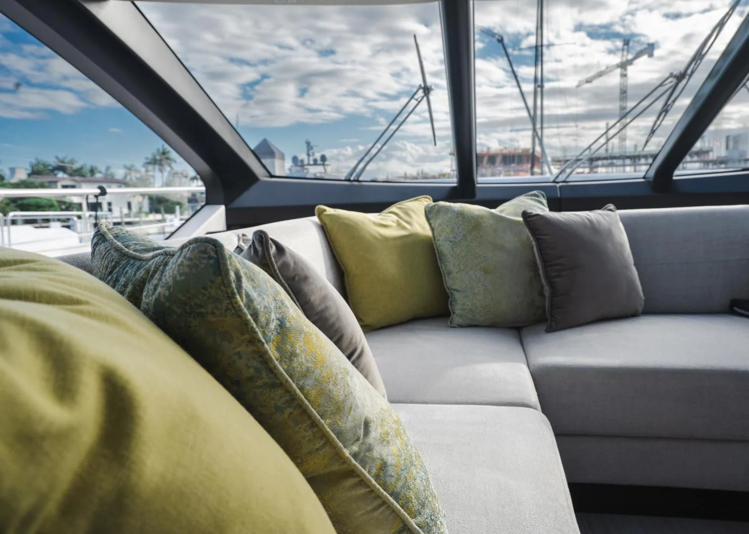 a couch with pillows aboard INCENTIVIZED Yacht for Sale