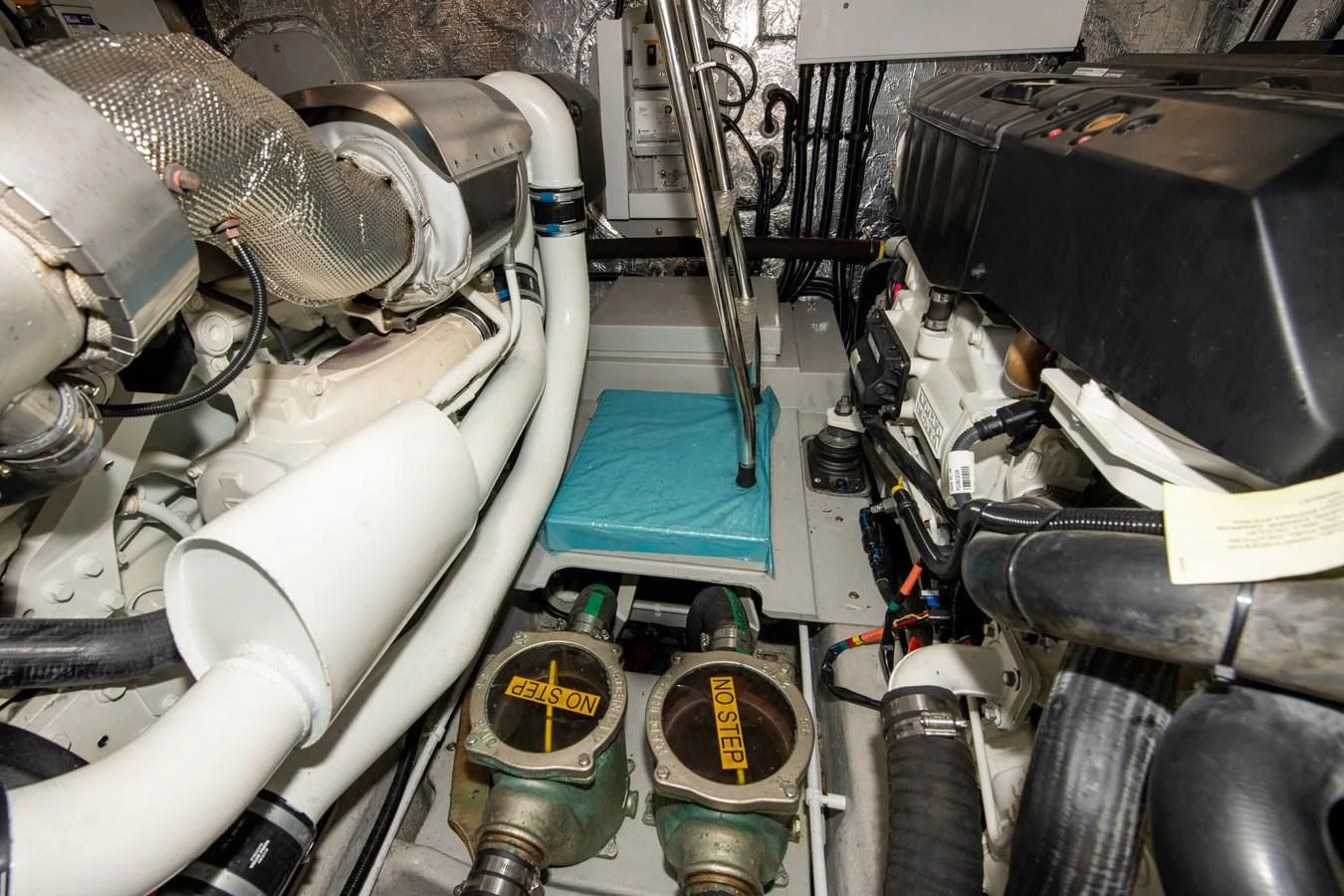 a close-up of a car engine aboard INCENTIVIZED Yacht for Sale