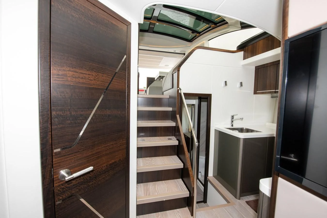 a wooden bunk bed in a room aboard INCENTIVIZED Yacht for Sale
