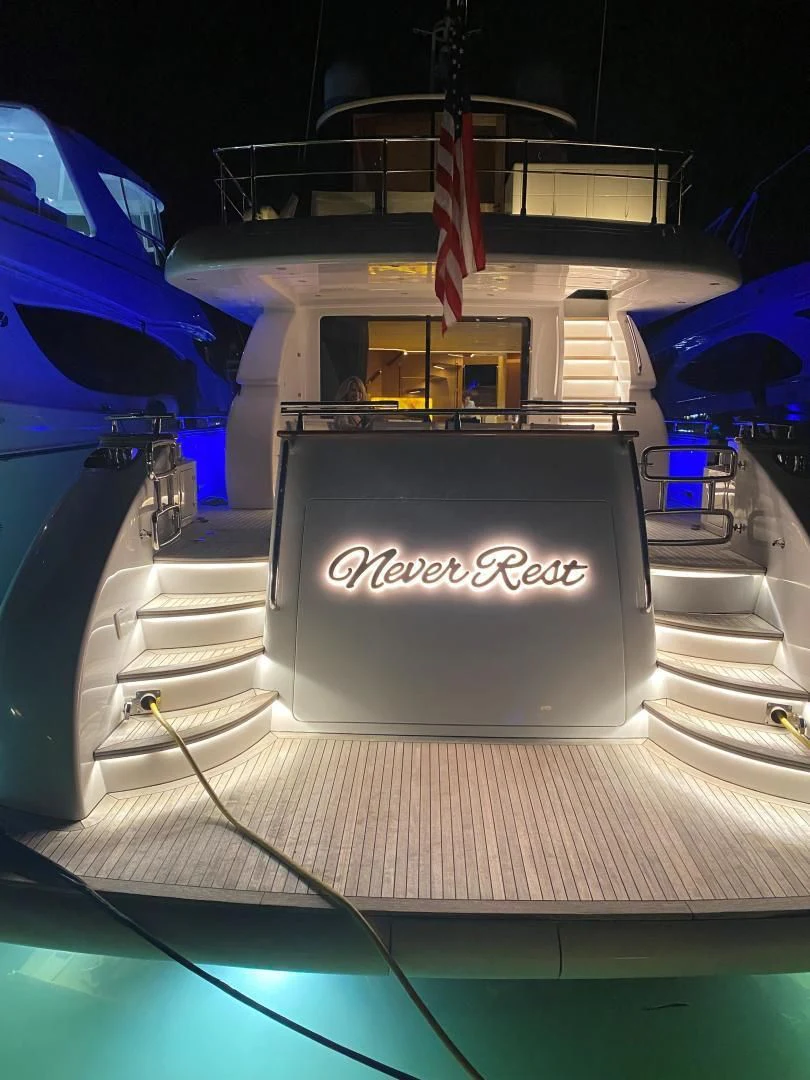a sign on a boat aboard NEVER REST Yacht for Sale