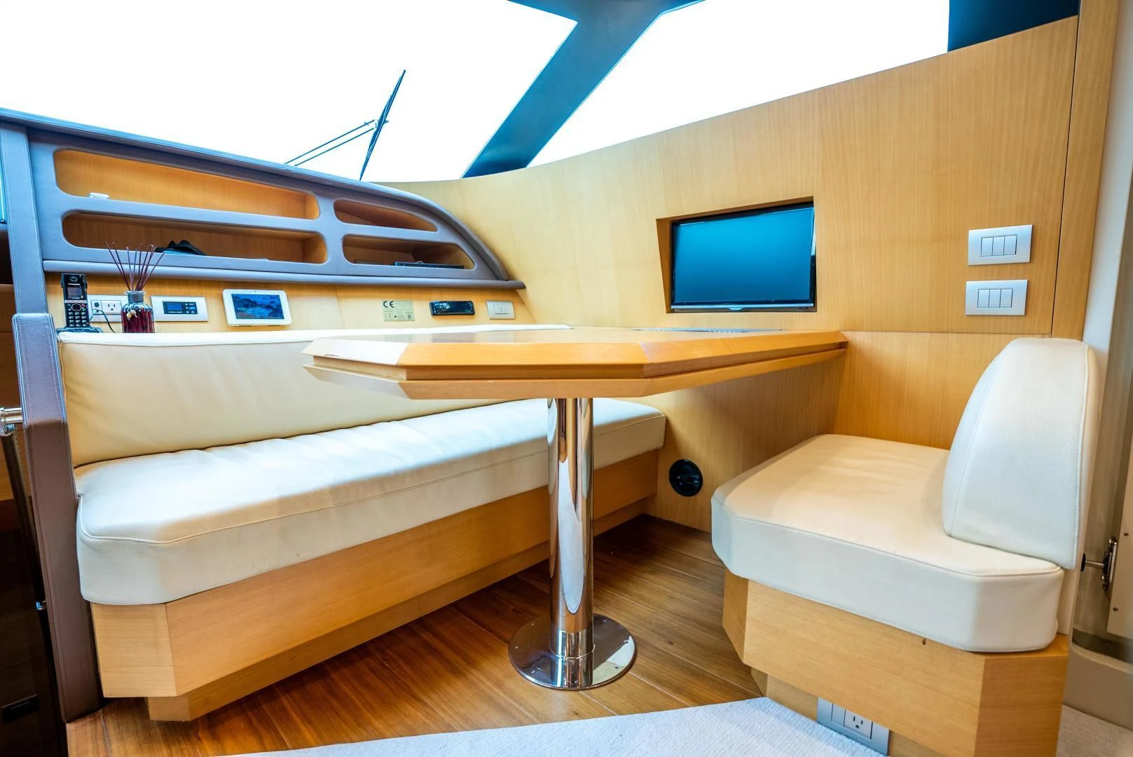 a bed and a desk in a room aboard NEVER REST Yacht for Sale