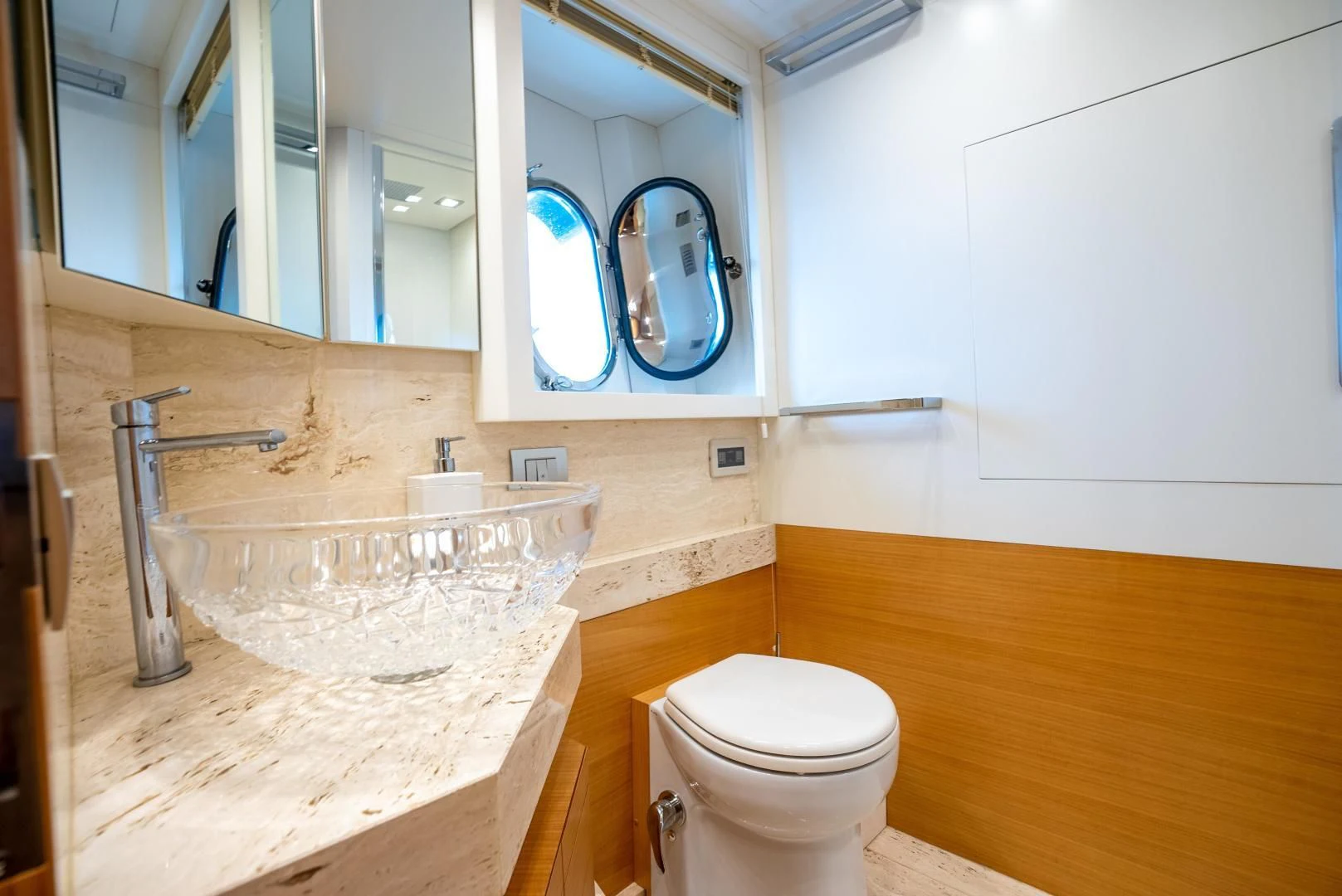 a bathroom with a sink and a toilet aboard NEVER REST Yacht for Sale