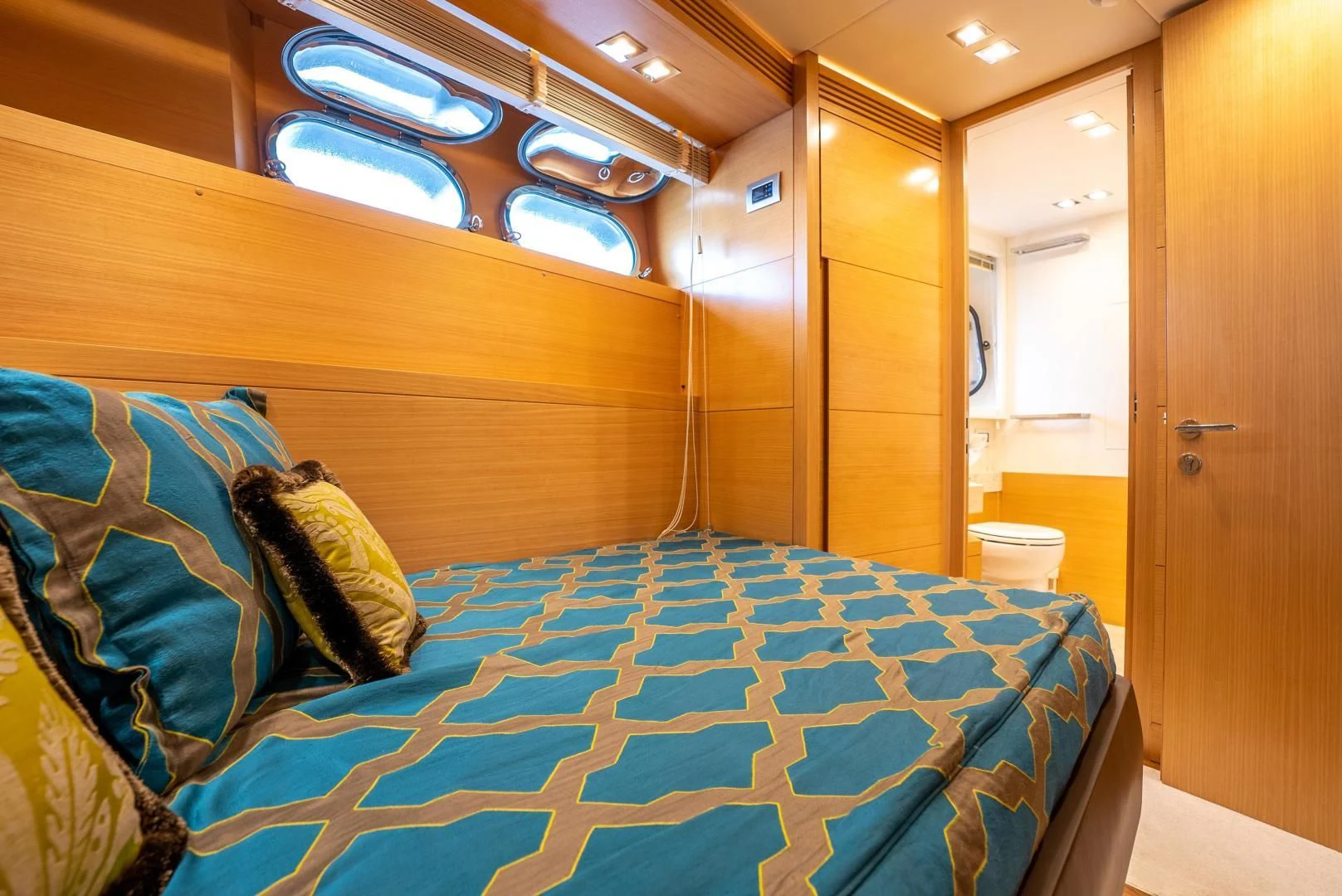 a bed in a room aboard NEVER REST Yacht for Sale