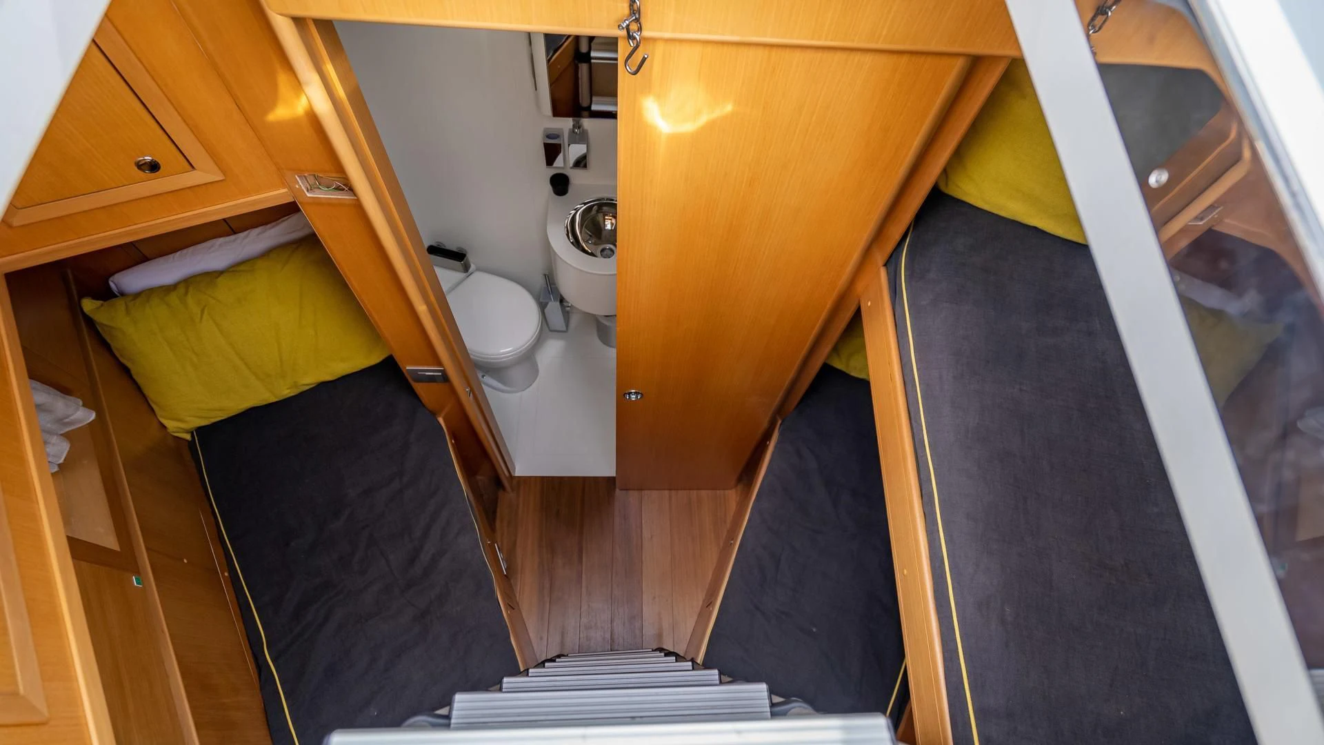 a view of a bathroom from the top of a bunk bed aboard NEVER REST Yacht for Sale