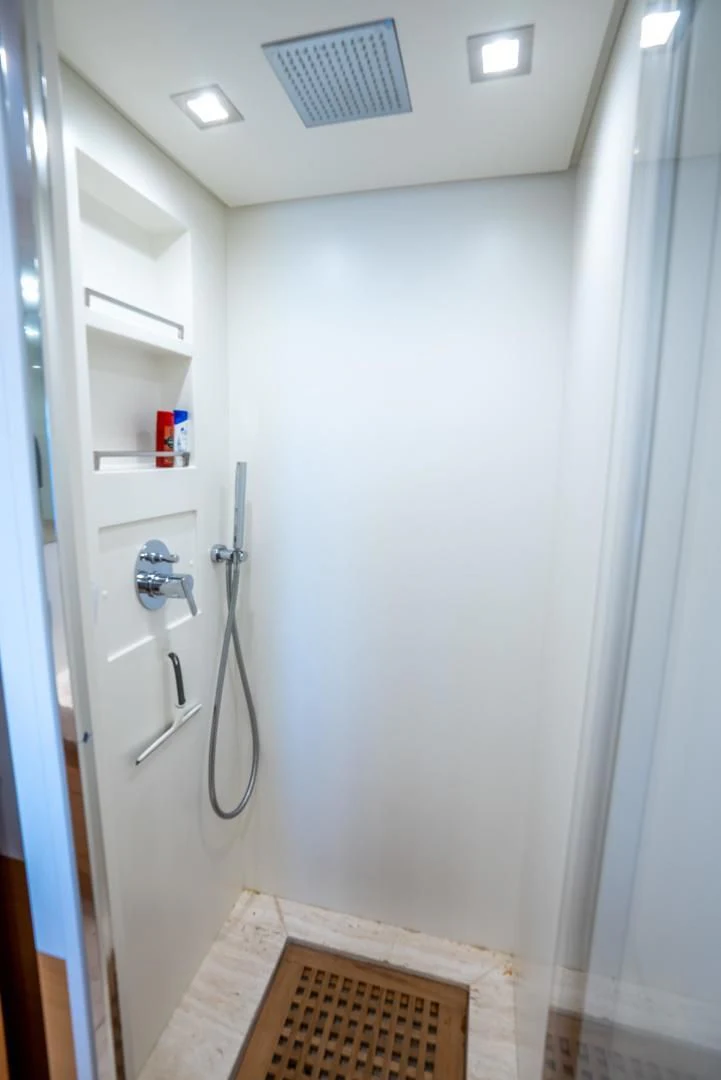 a white door with a handle aboard NEVER REST Yacht for Sale