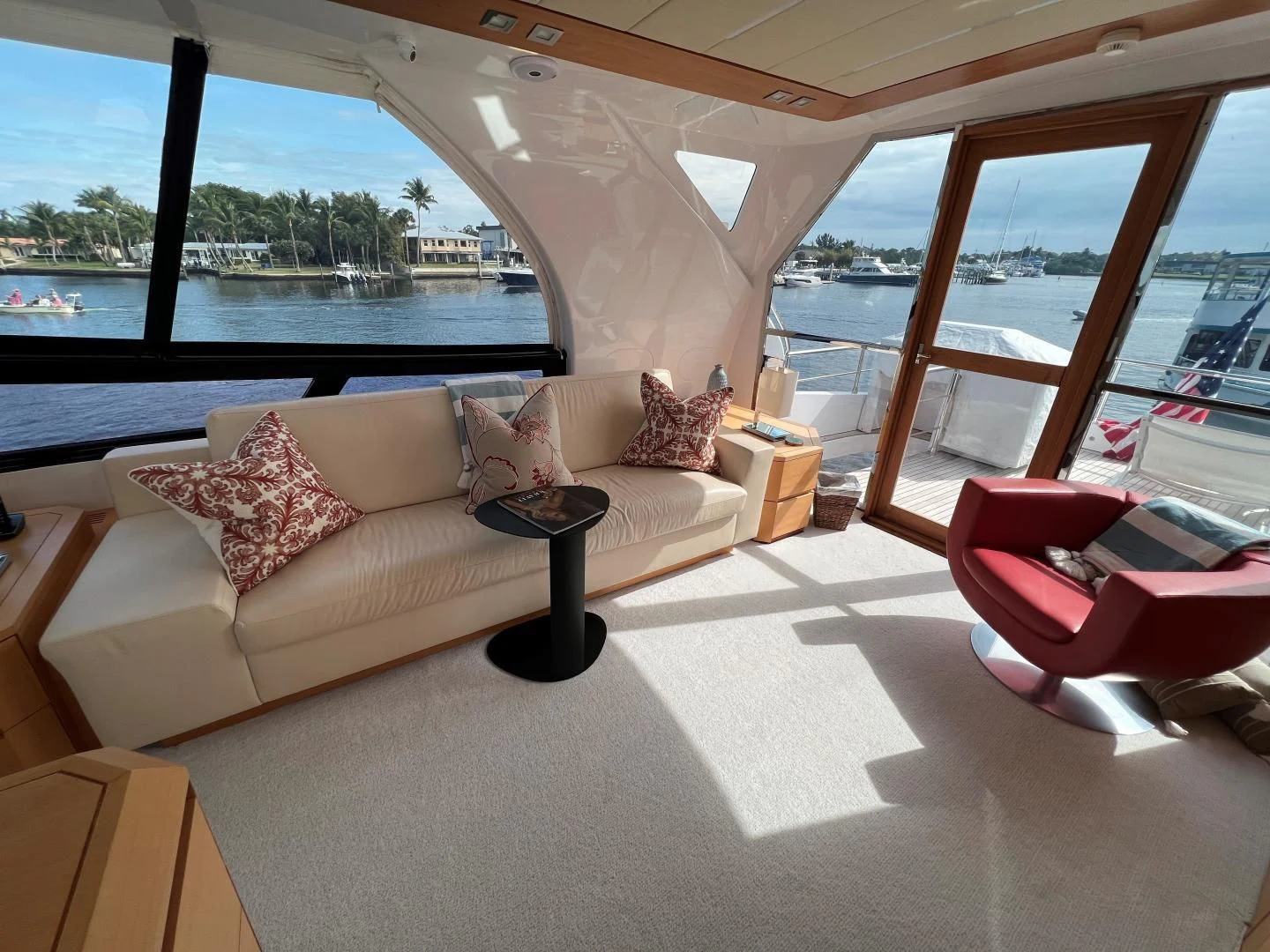 a living room with a couch and a table aboard NEVER REST Yacht for Sale
