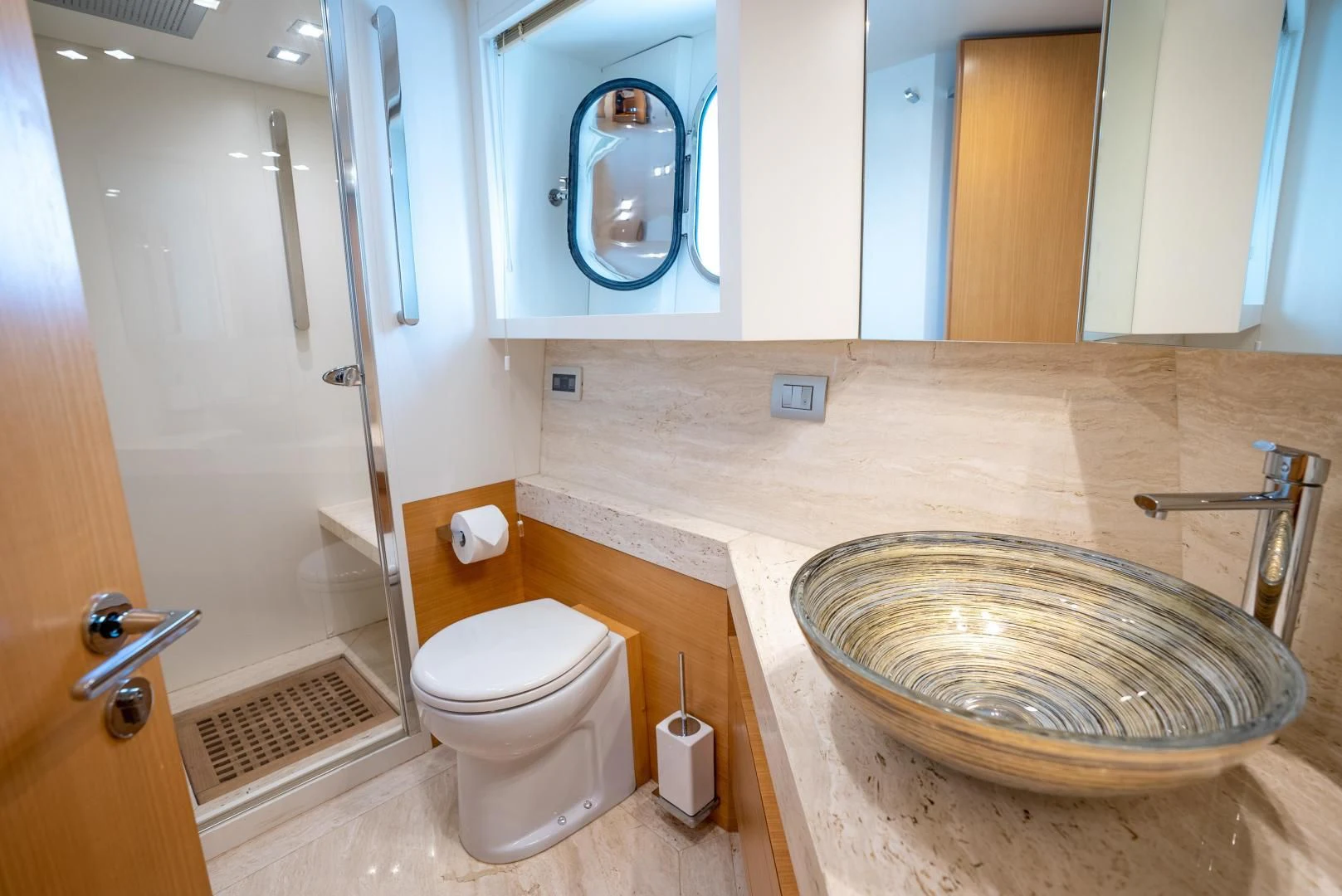 a bathroom with a sink and toilet aboard NEVER REST Yacht for Sale