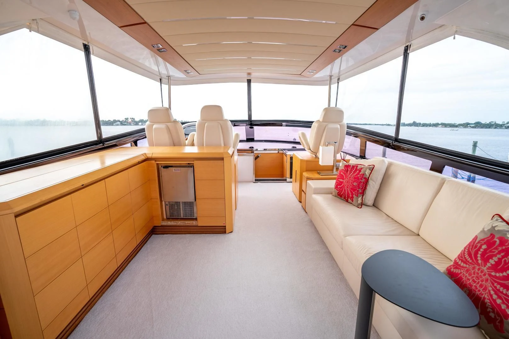 a living room with a large window aboard NEVER REST Yacht for Sale