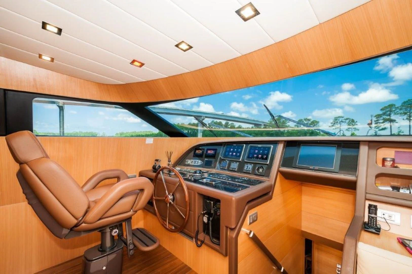 a room with a desk and a computer aboard NEVER REST Yacht for Sale
