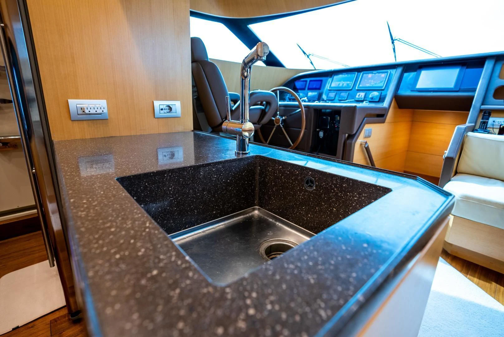 a kitchen with a sink and a counter aboard NEVER REST Yacht for Sale