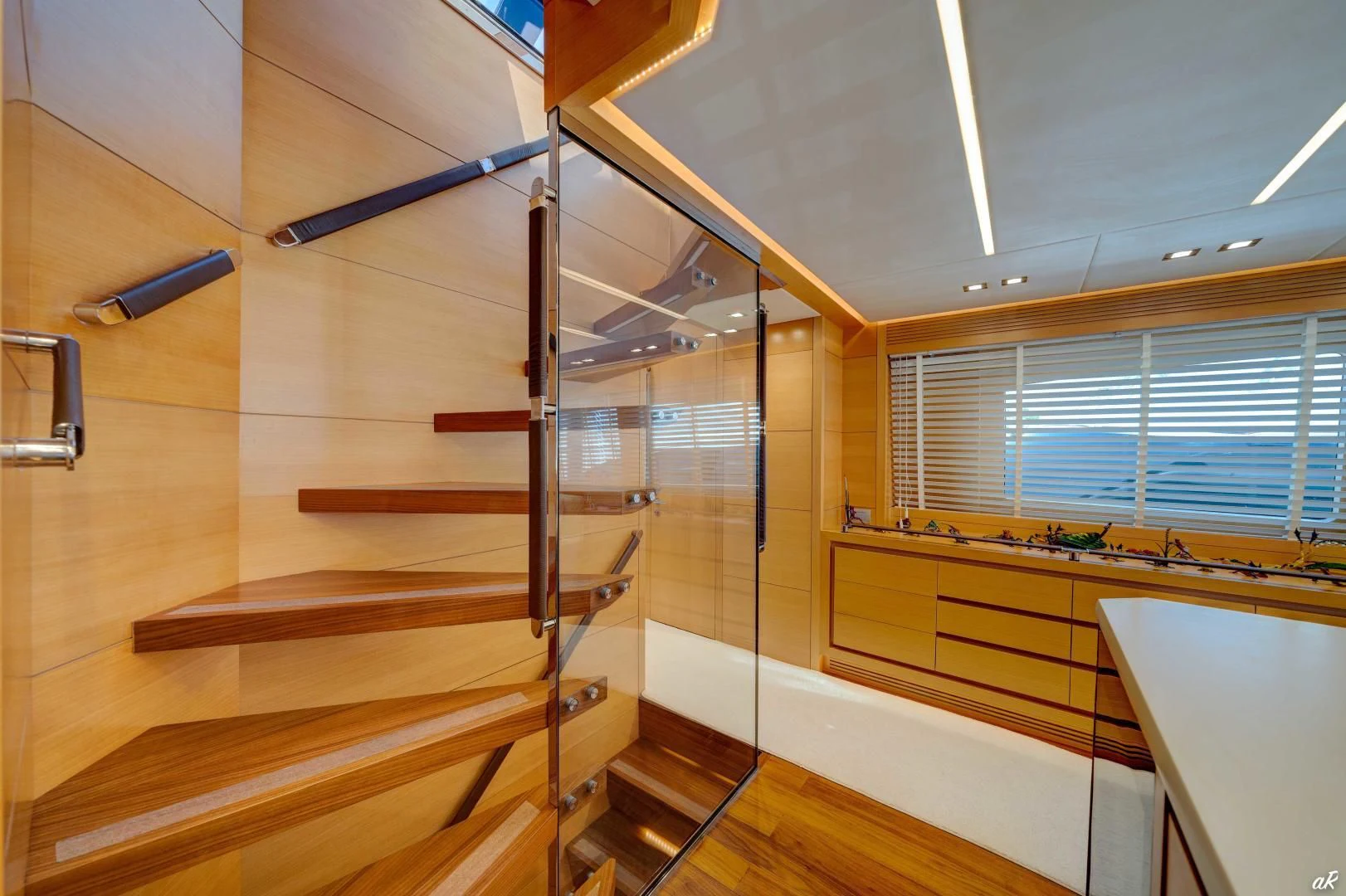 a wooden staircase in a building aboard NEVER REST Yacht for Sale