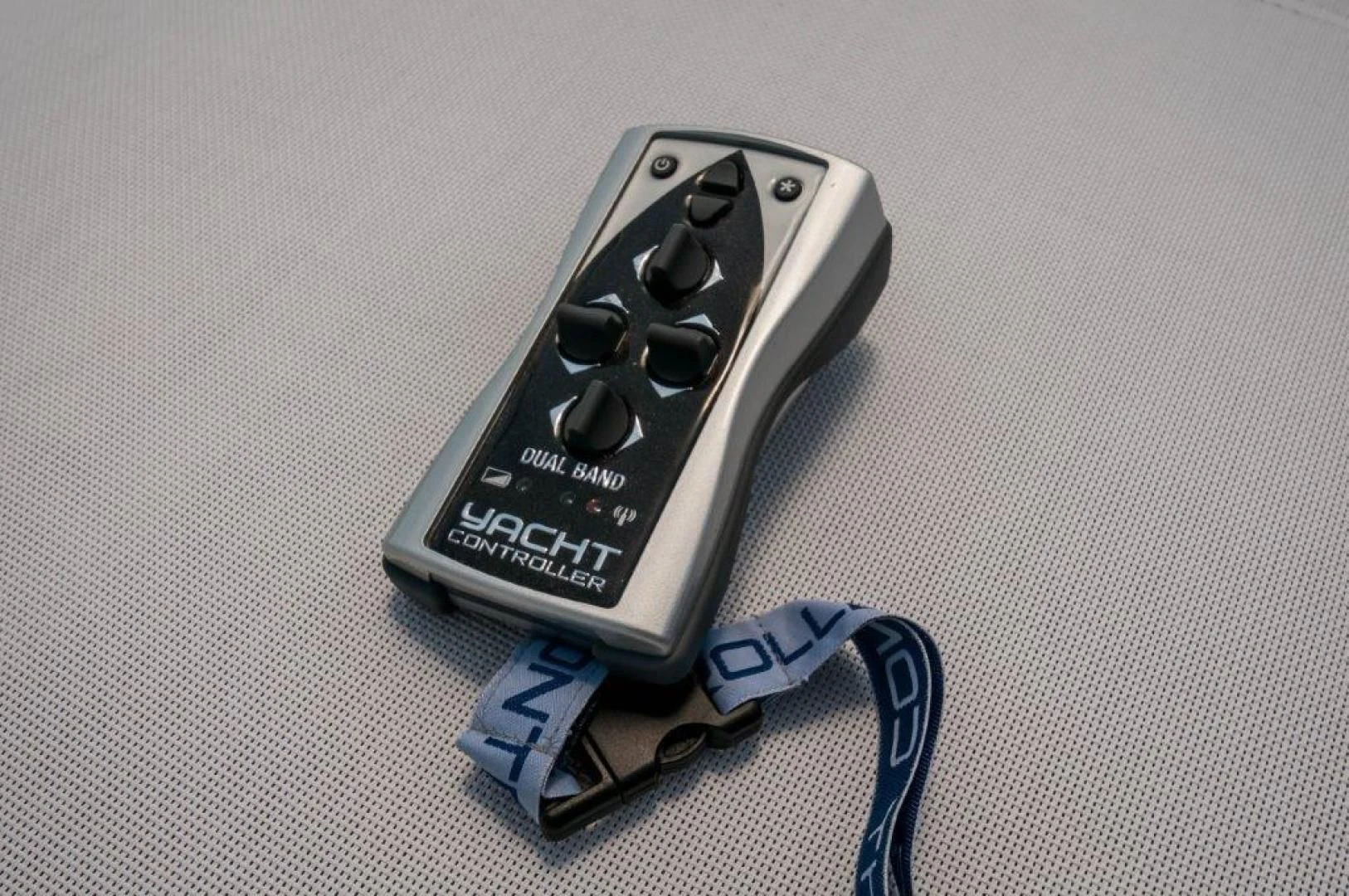 a black and silver keychain aboard NEVER REST Yacht for Sale