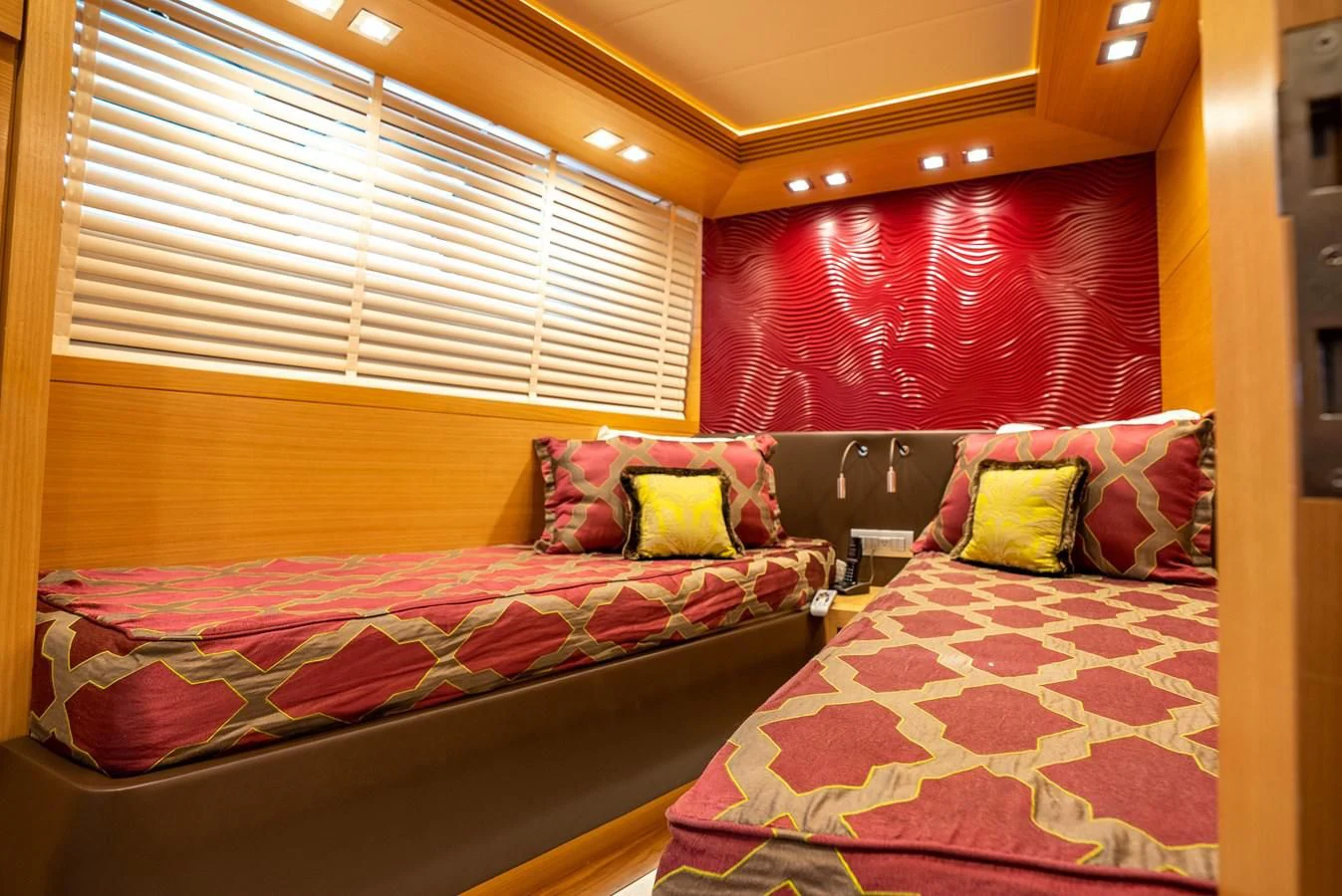 a room with two beds aboard NEVER REST Yacht for Sale