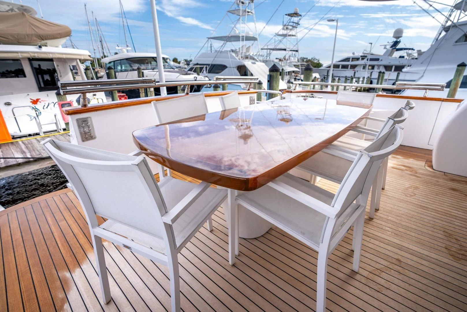 a table and chairs on a boat aboard NEVER REST Yacht for Sale
