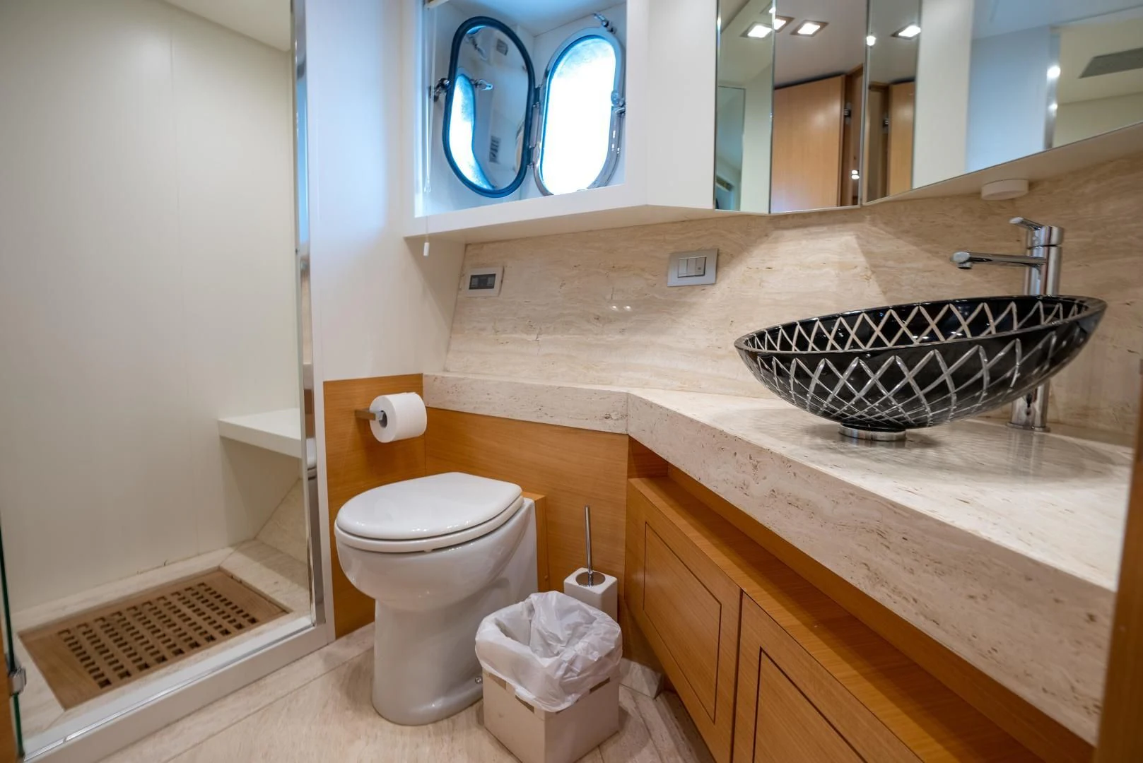 a bathroom with a sink and a toilet aboard NEVER REST Yacht for Sale