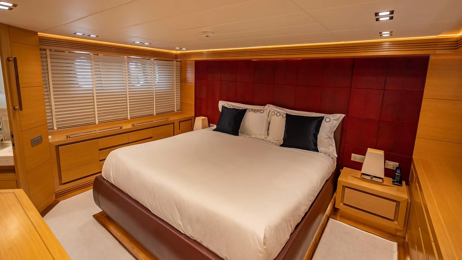 a bed in a room aboard NEVER REST Yacht for Sale