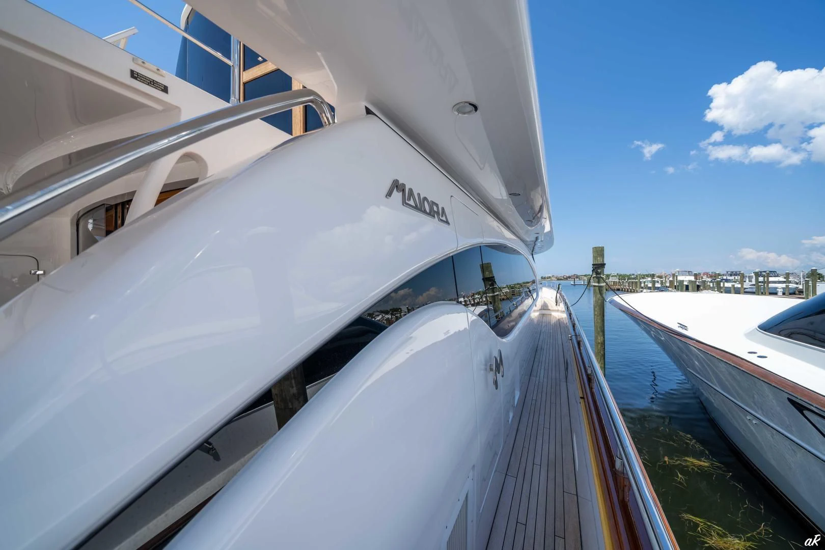 several boats docked at a pier aboard NEVER REST Yacht for Sale