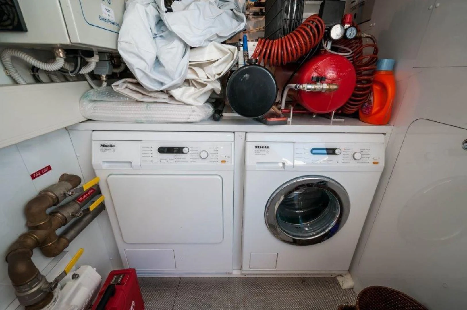 a white washing machine aboard NEVER REST Yacht for Sale