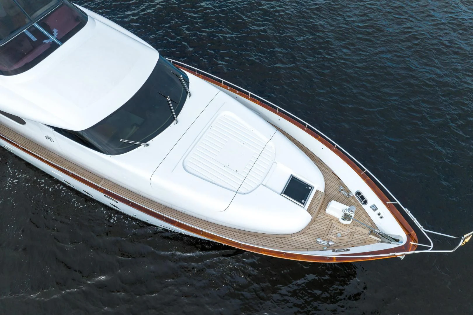 a white car on a road aboard NEVER REST Yacht for Sale