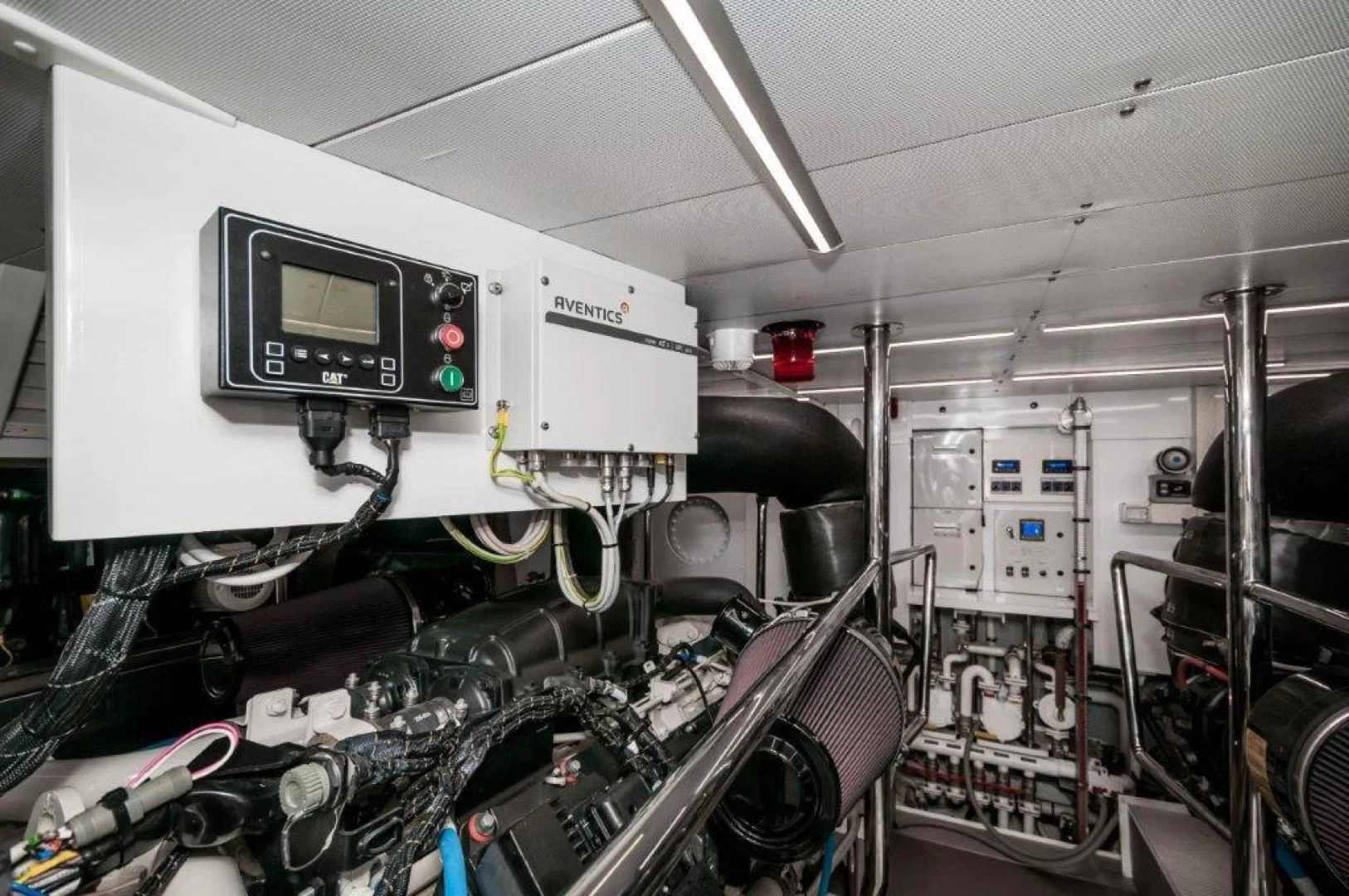 a computer monitor and other equipment in a room aboard NEVER REST Yacht for Sale