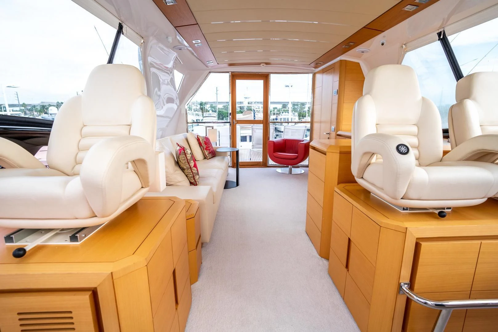 inside of a building with a white robot and red chairs aboard NEVER REST Yacht for Sale
