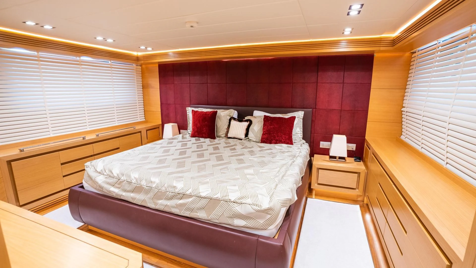 a room with a bed and a desk aboard NEVER REST Yacht for Sale