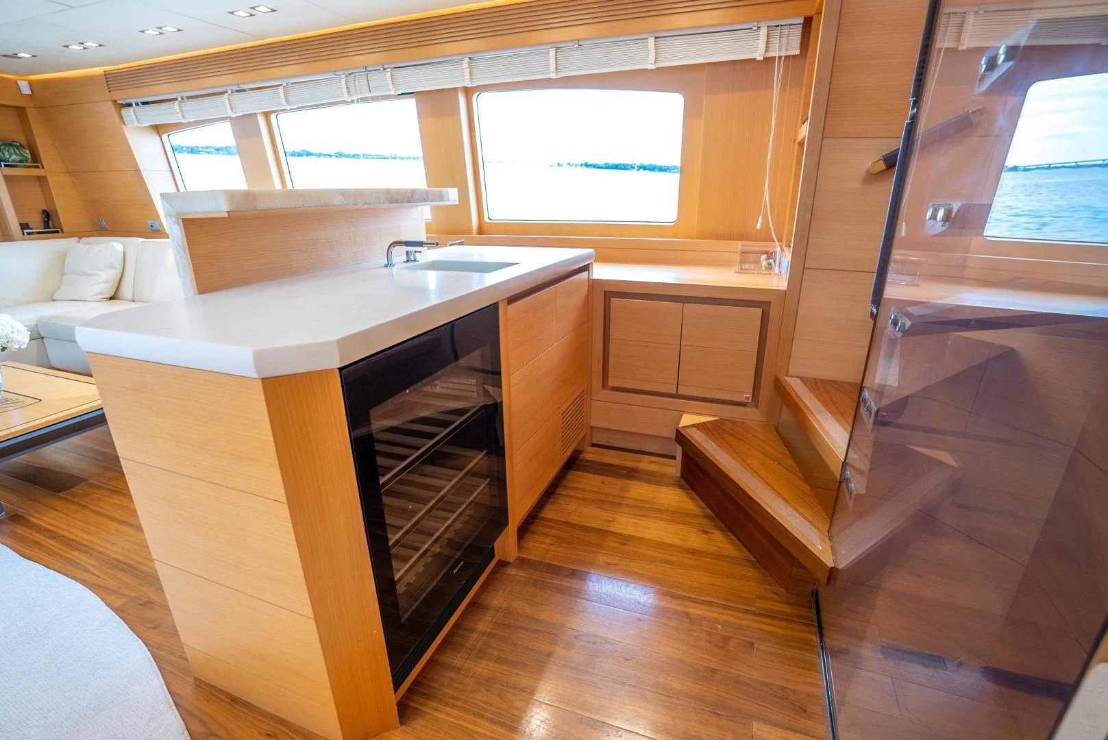 a kitchen with a wood floor aboard NEVER REST Yacht for Sale