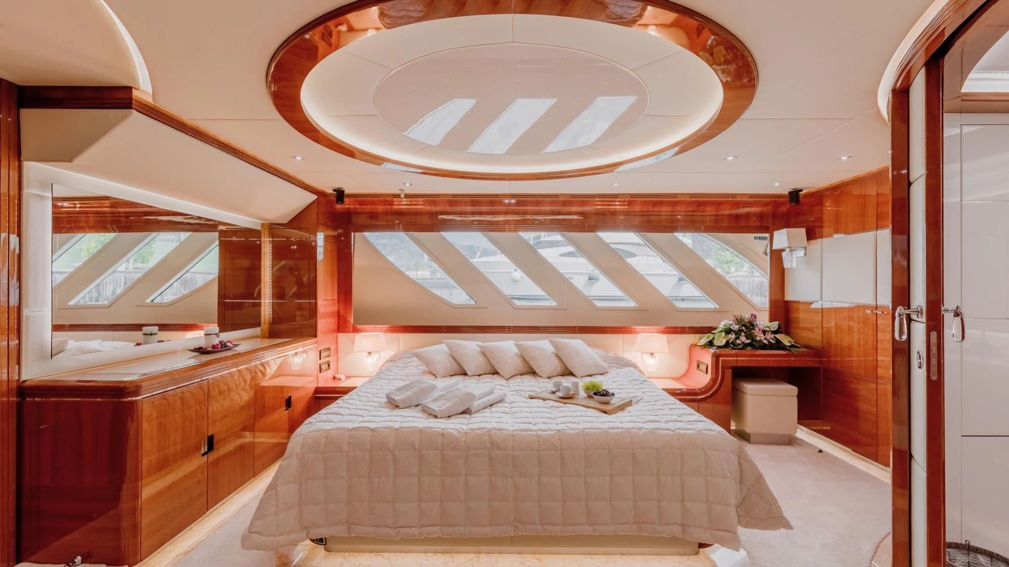 a bed in a room aboard LADY MURA Yacht for Sale