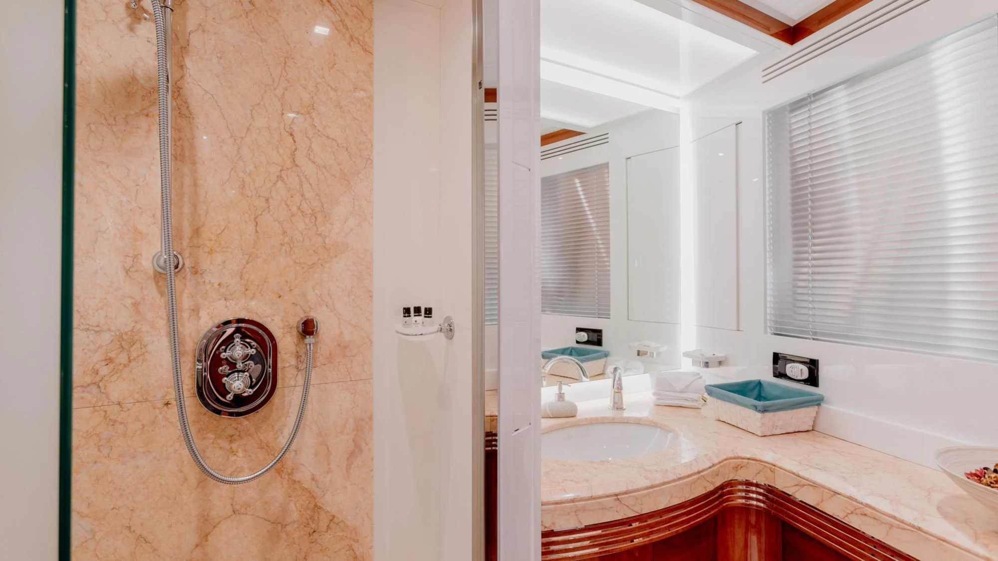 a bathroom with a sink and a shower aboard LADY MURA Yacht for Sale