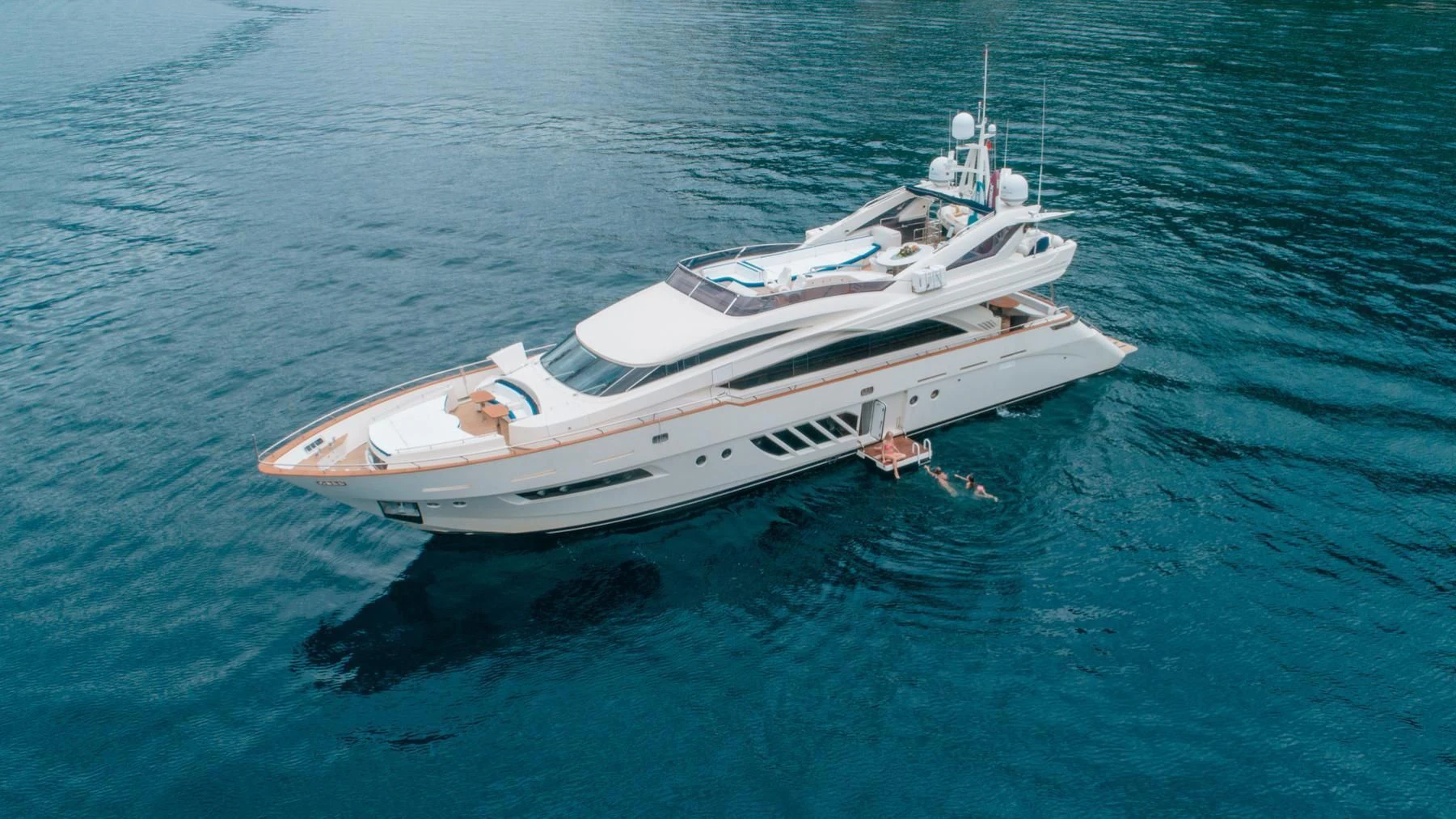a white boat in the water aboard LADY MURA Yacht for Sale
