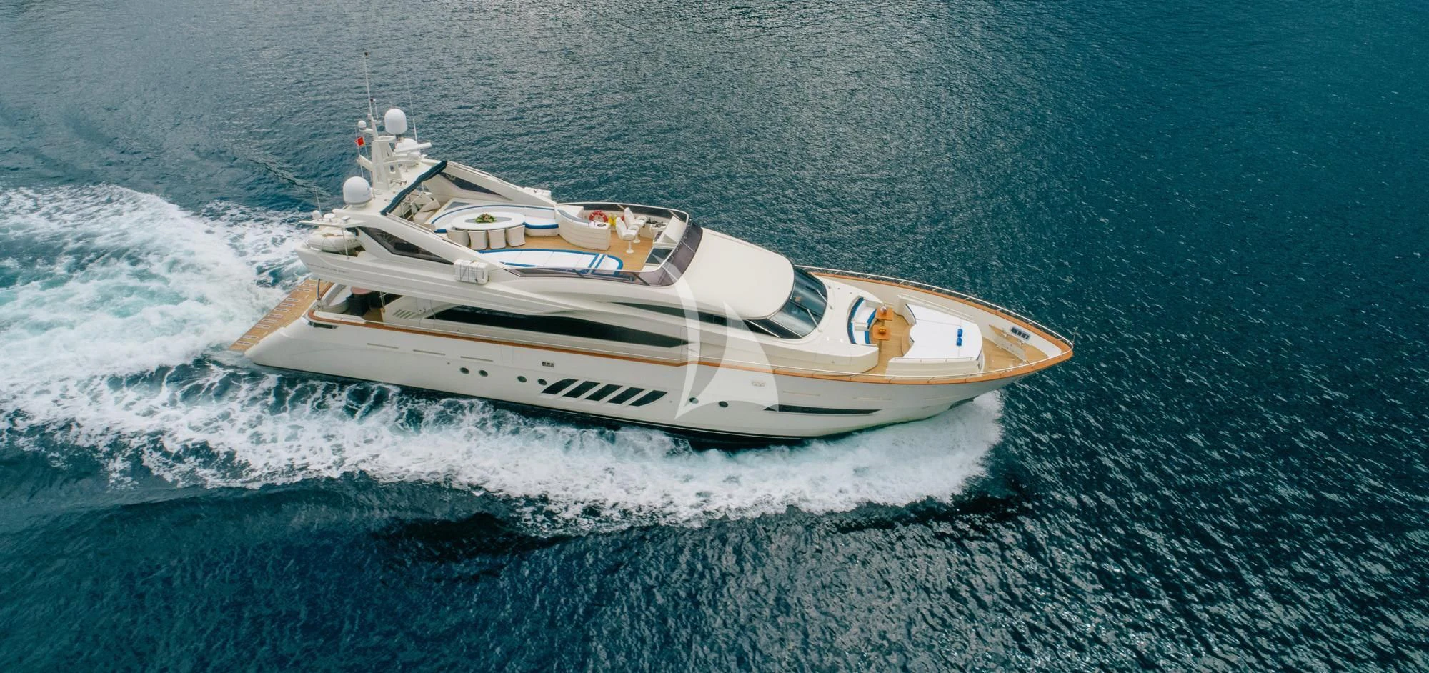 a white boat on the water aboard LADY MURA Yacht for Sale