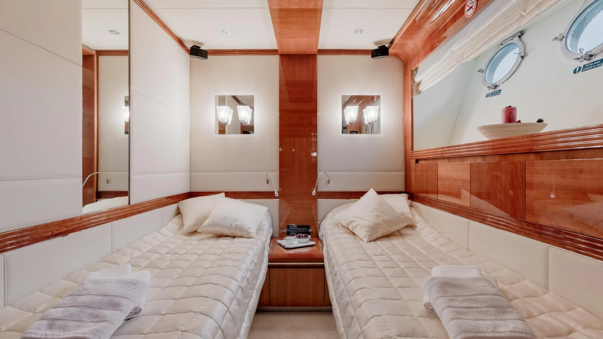 a room with two beds aboard LADY MURA Yacht for Sale