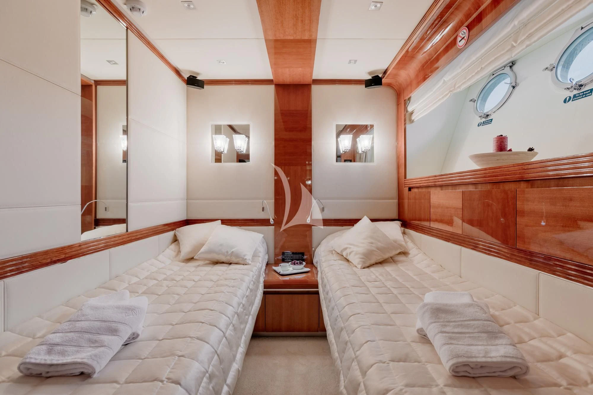 a room with two beds aboard LADY MURA Yacht for Sale