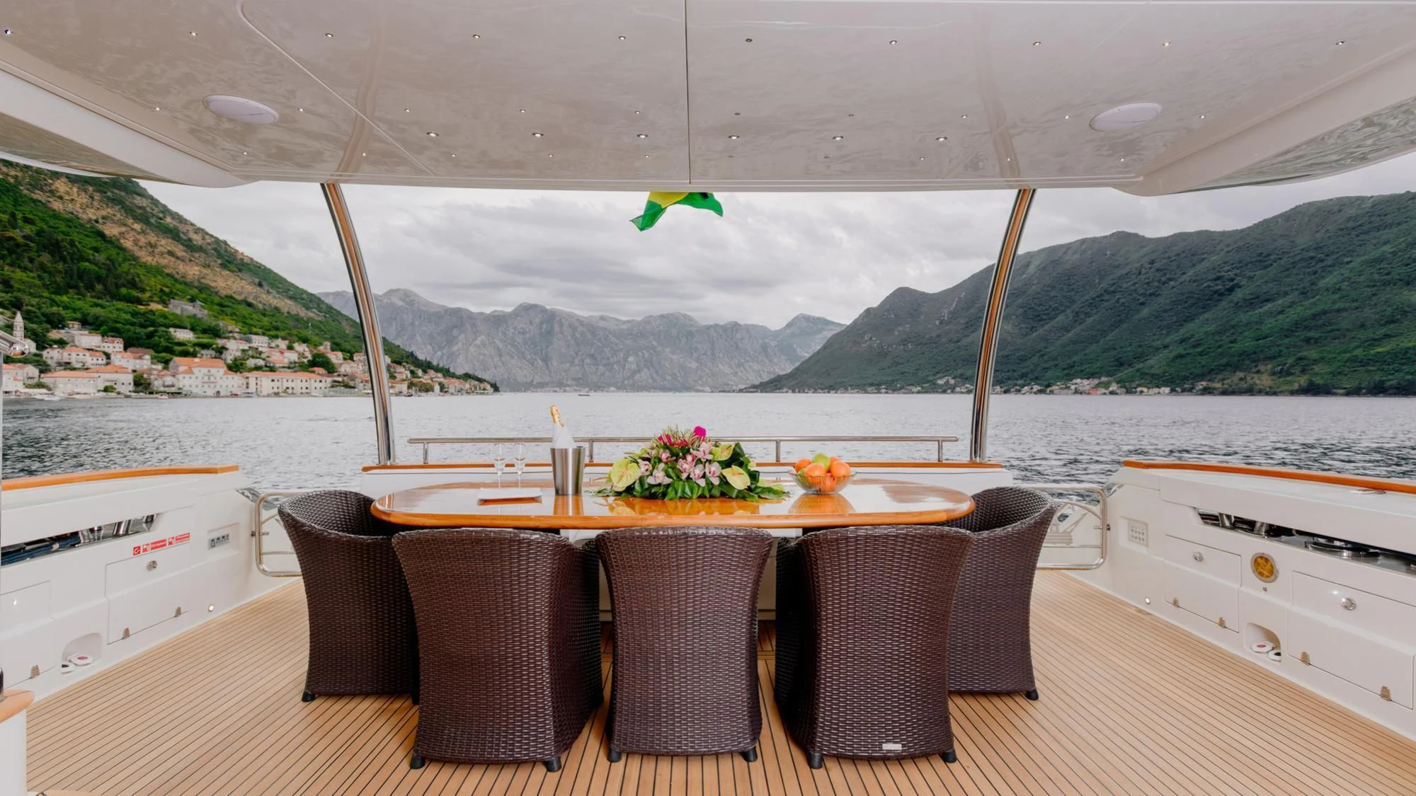a table set for a meal on a boat aboard LADY MURA Yacht for Sale